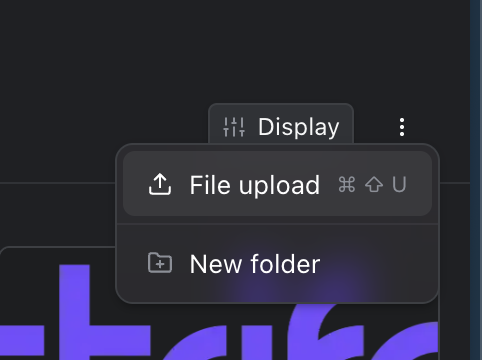 The media library's menu with File upload and New folder.